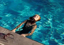 Isabelle Huppert on her bathing suit: "Yeah, it’s beautiful. I kept it. I think it’s an Eres, you know."